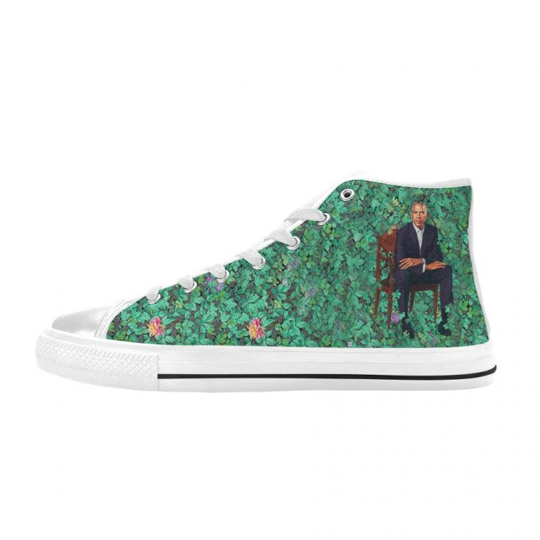 Barack Obama is the 44th President of the United States of America and the first Black Leader of the Nation BLM and Black Lives Matter protests erupted by Official Portait that was a Painting of Barack Obama by a Black Man in Plants with a bush by famous artist painter Kehinde Wiley styled chucks or chuck taylor