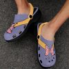 1792755f3892a87e3c0f9806c75934fe Daisy Duck Sailor's Crocs are made from advanced EVA material, lightweight & flexible Features ventilation holes, Supportive insole.
