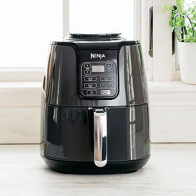 Experience culinary excellence with the Ninja AF101 Air Fryer from Abundifind. This versatile kitchen companion delivers healthier meals with crisp, roasted, reheated, and dehydrated options. With a 4-quart capacity, it's perfect for family cooking and fits up to 2 lbs of French fries. Reduce fat content by up to 75% compared to traditional frying methods, enjoying guilt-free indulgence while maintaining a balanced diet. The wide temperature range, from 105°F to 400°F, provides precise control for gentle dehydration or achieving a perfect, crispy finish. Choose from four cooking programs — Air Fry, Roast, Reheat, and Dehydrate — to unleash your culinary creativity. Dishwasher-safe parts and easy-to-clean exterior make maintenance a breeze. The purchase includes the Shark Air Fryer, a 4 Quart Nonstick Basket, Crisper Plate, and a 20-recipe booklet. Elevate your cooking experience and invest in the Ninja Air Fryer from Abundifind, where quality meets innovation.