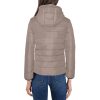 A premium Women's Padded Hooded Jacket in a sleek design, combining style and warmth. Superior to Zavetti Canada jackets and even the renowned Canada Goose brand, The jacket features a carefully crafted hood and quilted lining for maximum insulation and protection against the cold. It offers exceptional comfort with a zipper closure and two convenient pouch pockets. The high-quality Mercerized cotton padded lining ensures a luxurious and cozy womens winter coats experience. The jacket's vibrant color design remains vivid even after multiple machine washes, guaranteeing long-lasting appeal. Elevate your outerwear collection with this statement piece that reflects your unique personality.