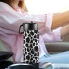 Custom Sports Water Bottle with Straw Lid - Premium stainless steel construction ensures durability and non-toxicity. Flip straw lid design for convenient opening and closing. Durable folding handle for easy portability at the gym. Double wall insulation keeps drinks warm or cold for a longer duration. Large 18 Oz capacity suitable for various occasions. Hand wash ONLY with soapy hot water for maintenance.