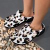 Introducing our Animal Print Premium EVA Cloggs, a superior alternative to Crocs that will leave you feeling confident in their unmatched quality. Here's why: • Like Crocs our Clogs are made from advanced EVA material, lightweight and flexible. • Slip-on style, easy put on and take off. • Features ventilation holes, easy and quick to drain moisture and debris. • Features heel strap for a secure fit, two ways to wear it. • Supportive insole makes your feet comfortable for a long time. • Easy to clean with soap and water.