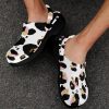 Introducing our Animal Print Premium EVA Cloggs, a superior alternative to Crocs that will leave you feeling confident in their unmatched quality. Here's why: • Like Crocs our Clogs are made from advanced EVA material, lightweight and flexible. • Slip-on style, easy put on and take off. • Features ventilation holes, easy and quick to drain moisture and debris. • Features heel strap for a secure fit, two ways to wear it. • Supportive insole makes your feet comfortable for a long time. • Easy to clean with soap and water.