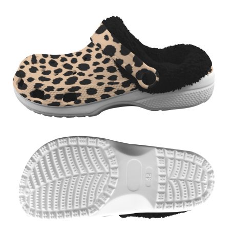 Crocs Clogg Cloggs - Waterproof and dirt-resistant with foam for breathability and walking comfort. Experience the cozy warmth of Sherpa Fleece thermal lining in trendy animal prints like rose gold Cheetah, Cow, Dalmatian, and Leopard. Made with Ethylene Vinyl Acetate (EVA) material, these Crocs are perfect for lounging in style.