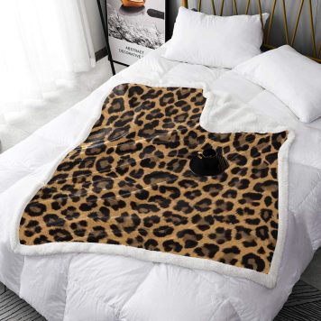 Introducing the Abundifind's Animal Print Premium Sherpa Fleece Blanket: Where Functionality Meets Wild Style! Experience the perfect blend of functionality and style with our Animal Print Premium Sherpa Fleece Blanket. Available in a range of captivating designs including Cheetah Print, Cow Print, Leopard Print, and Rose Leopard Print, this blanket is designed to enhance your overall comfort and elevate your snuggling experience. Not only that, but our blankets are built to last, ensuring they can withstand the demands of your daily routine without compromising on performance. Here's what makes our blanket truly special: - Thermally Efficient Sherpa Fleece: Crafted from thermally efficient Sherpa fleece, our blanket offers a wide range of benefits. Whether it's providing exceptional warmth or insulating you from chilly weather, you can rely on the soft and cozy Sherpa fleece to keep you snug and comfortable. - Exceptional Durability: We understand that a long-lasting blanket is essential. Our blankets are built to withstand the test of time, ensuring they maintain their quality and performance no matter how frequently you use them. - Stylish Animal Print Designs: Animal prints are known for their bold and adventurous style. Our Animal Print Premium Sherpa Fleece Blankets feature captivating designs, including Cheetah Print, Cow Print, Leopard Print, and Rose Leopard Print. Add a touch of wildness to your space and showcase your unique style with these eye-catching prints. - Cozy One-Sided Print and Plush Backside: The one-sided print of our blanket showcases the captivating animal print design, while the plush backside enhances the overall comfort and cosiness, enveloping you in warmth and luxury. Wrap yourself in the comfort and style of the "Abundifind's Animal Print Premium Sherpa Fleece Blanket". Whether you're seeking to elevate your snuggling experience, add a touch of wildness to your space, or simply appreciate the durability and warmth of Sherpa fleece, this blanket is the perfect choice. Embrace the functionality and wild style it offers, and enjoy the cozy comfort it brings to your daily routine. .: 100% Sherpa fleece .: One-sided print .: Plush backside .: Animal Print Premium Sherpa Fleece Blanket