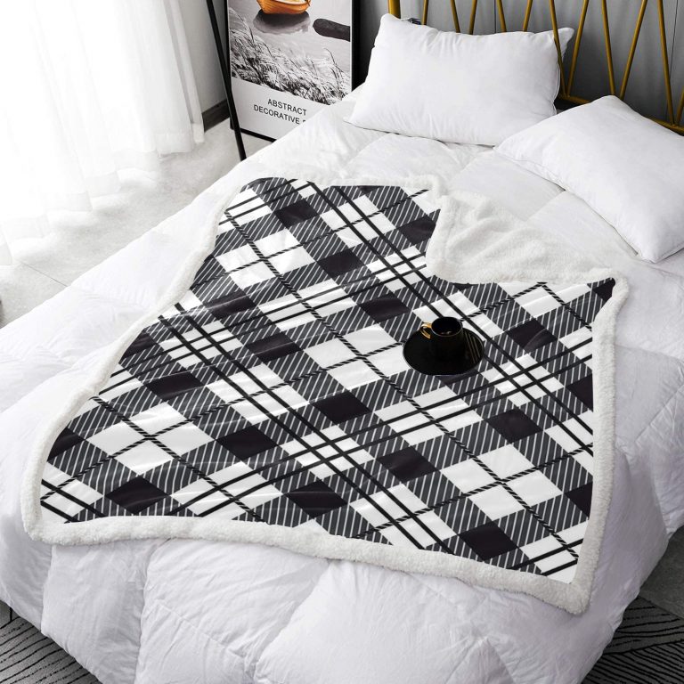 Introducing the Abundifind's Plaid Premium Sherpa Fleece Blanket: Where Functionality Meets Style! Experience the perfect blend of functionality and style with our Plaid Premium Sherpa Fleece Blanket, available in Black, Blue, Green, Pink or Red. Designed to enhance your overall comfort, this blanket brings a host of benefits that will elevate your snuggling experience. Not only that, but our blankets are built to last, ensuring they can withstand the demands of your daily routine without compromising on performance. Here's what makes our blanket truly special: - Thermally Efficient Sherpa Fleece: Our blanket is crafted from thermally efficient Sherpa fleece, which offers a wide range of benefits. Whether it's providing exceptional warmth or insulating you from chilly weather, you can rely on the soft and cozy Sherpa fleece to keep you snug and comfortable. - Exceptional Durability: We understand the importance of a long-lasting blanket. That's why our blankets are built to withstand the test of time. No matter how frequently you use them, our blankets will maintain their quality and performance. - Stylish Plaid Design: Plaid patterns have a rich history associated with different cultures and traditions. In Scottish culture, specific tartan plaids represent different clans or families, connecting individuals to their heritage and ancestry. Emotionally, plaid patterns can evoke different feelings based on personal experiences and cultural associations. In fashion and interior design, plaid patterns add visual interest and character to garments, accessories, and home decor. Our Plaid Premium Sherpa Fleece Blanket showcases a timeless plaid design that adds a touch of style to any setting. - Cozy One-Sided Print and Plush Backside: The one-sided print of our blanket features the captivating plaid pattern, while the plush backside enhances the overall comfort and cosiness. Wrap yourself in the comfort and style of the "Abundifind's Plaid Premium Sherpa Fleece Blanket." Whether you're looking to elevate your snuggling experience, add a touch of visual interest to your space, or simply appreciate the durability and warmth of Sherpa fleece, this blanket is the perfect choice. Embrace the functionality and style it offers, and enjoy the cozy comfort it brings to your daily routine. .: 100% sherpa fleece .: One-sided print .: Plush backside .: Plaid Premium Sherpa Fleece Blanket