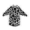 Animal Print Sherpa Fleece Hooded Robe Cloak Poncho image 10 Sherpa Fleece Animal Print Pullover Hooded Robe. Explore our collection of captivating prints, including Cheetah, Cow, Leopard, and Rose Leopard, adding a touch of untamed elegance to your wardrobe. This cloak envelops you in cozy warmth while showcasing seamless patterns that mimic the mesmerizing dots and spots found in nature's most exquisite animal skins. Unleash your wild side and elevate your style with this must-have fashion statement.