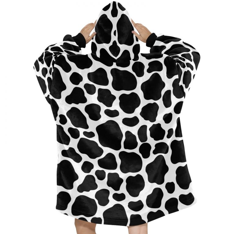 Sherpa Fleece Animal Print Pullover Hooded Robe. Explore our collection of captivating prints, including Cheetah, Cow, Leopard, and Rose Leopard, adding a touch of untamed elegance to your wardrobe. This cloak envelops you in cozy warmth while showcasing seamless patterns that mimic the mesmerizing dots and spots found in nature's most exquisite animal skins. Unleash your wild side and elevate your style with this must-have fashion statement.