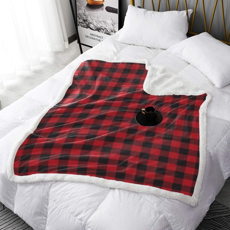 Introducing the Abundifind's Plaid Premium Sherpa Fleece Blanket: Where Functionality Meets Style! Experience the perfect blend of functionality and style with our Plaid Premium Sherpa Fleece Blanket, available in Black, Blue, Green, Pink or Red. Designed to enhance your overall comfort, this blanket brings a host of benefits that will elevate your snuggling experience. Not only that, but our blankets are built to last, ensuring they can withstand the demands of your daily routine without compromising on performance. Here's what makes our blanket truly special: - Thermally Efficient Sherpa Fleece: Our blanket is crafted from thermally efficient Sherpa fleece, which offers a wide range of benefits. Whether it's providing exceptional warmth or insulating you from chilly weather, you can rely on the soft and cozy Sherpa fleece to keep you snug and comfortable. - Exceptional Durability: We understand the importance of a long-lasting blanket. That's why our blankets are built to withstand the test of time. No matter how frequently you use them, our blankets will maintain their quality and performance. - Stylish Plaid Design: Plaid patterns have a rich history associated with different cultures and traditions. In Scottish culture, specific tartan plaids represent different clans or families, connecting individuals to their heritage and ancestry. Emotionally, plaid patterns can evoke different feelings based on personal experiences and cultural associations. In fashion and interior design, plaid patterns add visual interest and character to garments, accessories, and home decor. Our Plaid Premium Sherpa Fleece Blanket showcases a timeless plaid design that adds a touch of style to any setting. - Cozy One-Sided Print and Plush Backside: The one-sided print of our blanket features the captivating plaid pattern, while the plush backside enhances the overall comfort and cosiness. Wrap yourself in the comfort and style of the "Abundifind's Plaid Premium Sherpa Fleece Blanket." Whether you're looking to elevate your snuggling experience, add a touch of visual interest to your space, or simply appreciate the durability and warmth of Sherpa fleece, this blanket is the perfect choice. Embrace the functionality and style it offers, and enjoy the cozy comfort it brings to your daily routine. .: 100% sherpa fleece .: One-sided print .: Plush backside .: Plaid Premium Sherpa Fleece Blanket