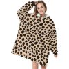 Animal Print Sherpa Fleece Hooded Robe Cloak Poncho image 04 Sherpa Fleece Animal Print Pullover Hooded Robe. Explore our collection of captivating prints, including Cheetah, Cow, Leopard, and Rose Leopard, adding a touch of untamed elegance to your wardrobe. This cloak envelops you in cozy warmth while showcasing seamless patterns that mimic the mesmerizing dots and spots found in nature's most exquisite animal skins. Unleash your wild side and elevate your style with this must-have fashion statement.