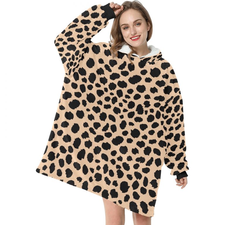Sherpa Fleece Animal Print Pullover Hooded Robe. Explore our collection of captivating prints, including Cheetah, Cow, Leopard, and Rose Leopard, adding a touch of untamed elegance to your wardrobe. This cloak envelops you in cozy warmth while showcasing seamless patterns that mimic the mesmerizing dots and spots found in nature's most exquisite animal skins. Unleash your wild side and elevate your style with this must-have fashion statement.