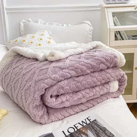 Embrace our Woven Lamb Wool Fleece Plush Throw Blanket, a must-have for anyone who craves style & coziness in their home. Experience warmth and elegance.