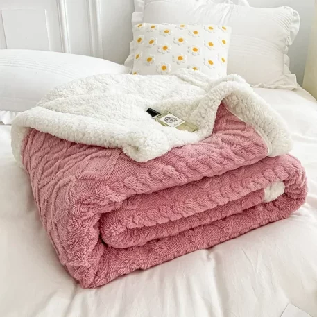 Embrace our Woven Lamb Wool Fleece Plush Throw Blanket, a must-have for anyone who craves style & coziness in their home. Experience warmth and elegance.