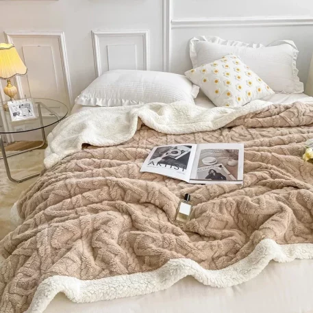 Embrace our Woven Lamb Wool Fleece Plush Throw Blanket, a must-have for anyone who craves style & coziness in their home. Experience warmth and elegance.