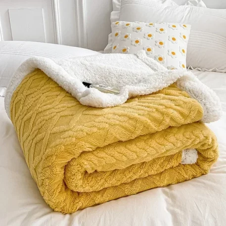 Embrace our Woven Lamb Wool Fleece Plush Throw Blanket, a must-have for anyone who craves style & coziness in their home. Experience warmth and elegance.