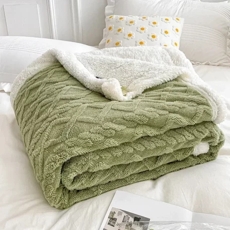 Embrace our Woven Lamb Wool Fleece Plush Throw Blanket, a must-have for anyone who craves style & coziness in their home. Experience warmth and elegance.