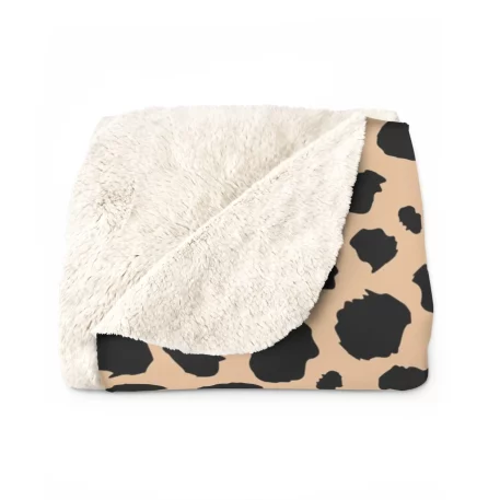 Animal Print Fleece Blanket and Sherpa Fleece Blanket featuring vibrant butterfly, cheetah, cow, Dalmatian, leopard, rose leopard, mermaid tail scale, and snow leopard patterns. Lightweight microfiber fleece provides breathable, year-round comfort, while the plush Sherpa fleece offers cozy warmth for chilly nights. Available in multiple sizes (30” x 40”, 50” x 60”, 60” x 80”), these blankets are machine washable, durable, and made in the USA. Ideal for home décor, travel, gifting, or snuggling during movie marathons, with fast 3-day production and shipping. Enjoy stylish comfort with premium, animal-themed blankets built to last.