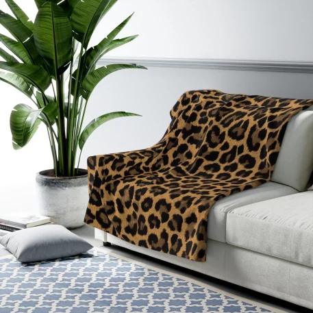 Animal Print Fleece Blanket and Sherpa Fleece Blanket featuring vibrant butterfly, cheetah, cow, Dalmatian, leopard, rose leopard, mermaid tail scale, and snow leopard patterns. Lightweight microfiber fleece provides breathable, year-round comfort, while the plush Sherpa fleece offers cozy warmth for chilly nights. Available in multiple sizes (30” x 40”, 50” x 60”, 60” x 80”), these blankets are machine washable, durable, and made in the USA. Ideal for home décor, travel, gifting, or snuggling during movie marathons, with fast 3-day production and shipping. Enjoy stylish comfort with premium, animal-themed blankets built to last.