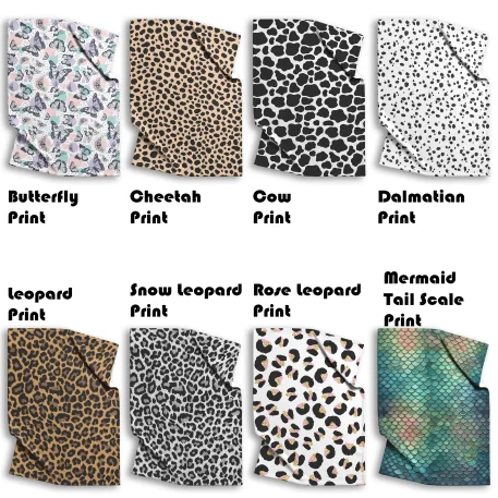 Animal Print Fleece Blanket and Sherpa Fleece Blanket featuring vibrant butterfly, cheetah, cow, Dalmatian, leopard, rose leopard, mermaid tail scale, and snow leopard patterns. Lightweight microfiber fleece provides breathable, year-round comfort, while the plush Sherpa fleece offers cozy warmth for chilly nights. Available in multiple sizes (30” x 40”, 50” x 60”, 60” x 80”), these blankets are machine washable, durable, and made in the USA. Ideal for home décor, travel, gifting, or snuggling during movie marathons, with fast 3-day production and shipping. Enjoy stylish comfort with premium, animal-themed blankets built to last.