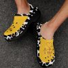 Cow print western clog with a yellow upper, black base, view 2