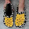 Cow print western clog with a yellow upper, black base, view 3