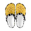 Cow print western clog with a yellow upper, product view 1