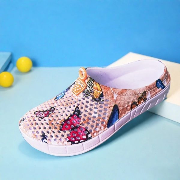 Women's butterfly print slip-on clog slippers in Orange